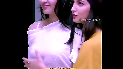 Elli Avram grabing Kajal Agarwal'_s big tits !